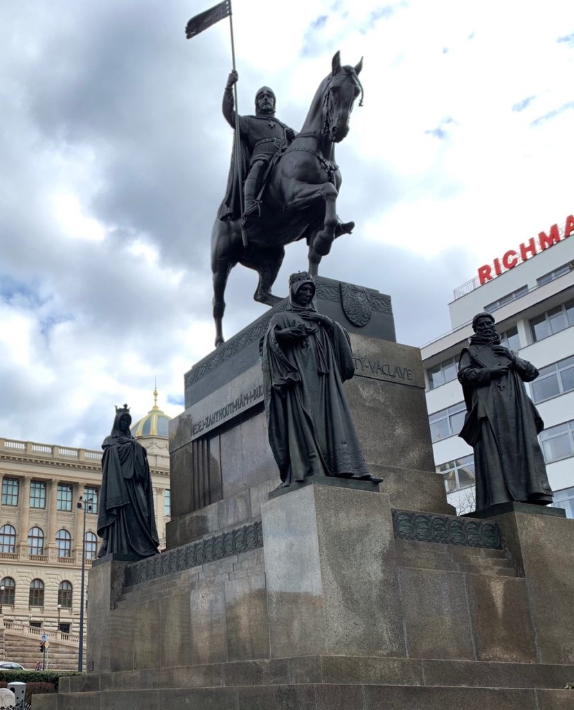 Statue of a King Wenceslas on a horse holding a flag