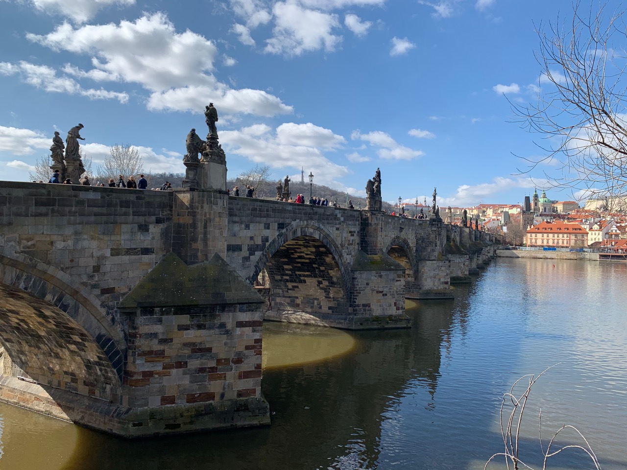 Charles Bridge stretching in arches across the river