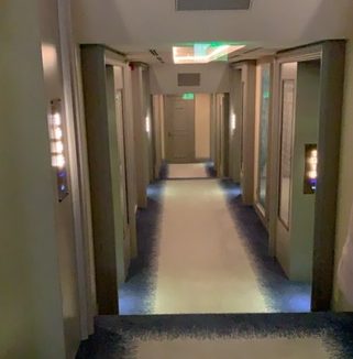 a hallway that steps down every fifteen feet