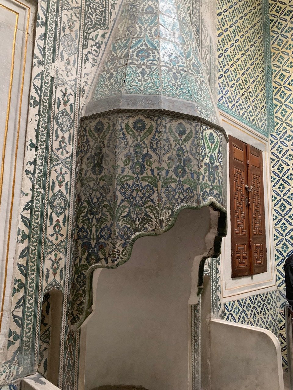 conical chimney inlaid with blue and green designs
