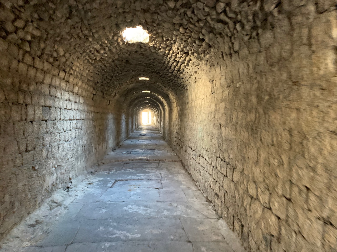 long tunnel with holes in the ceiling