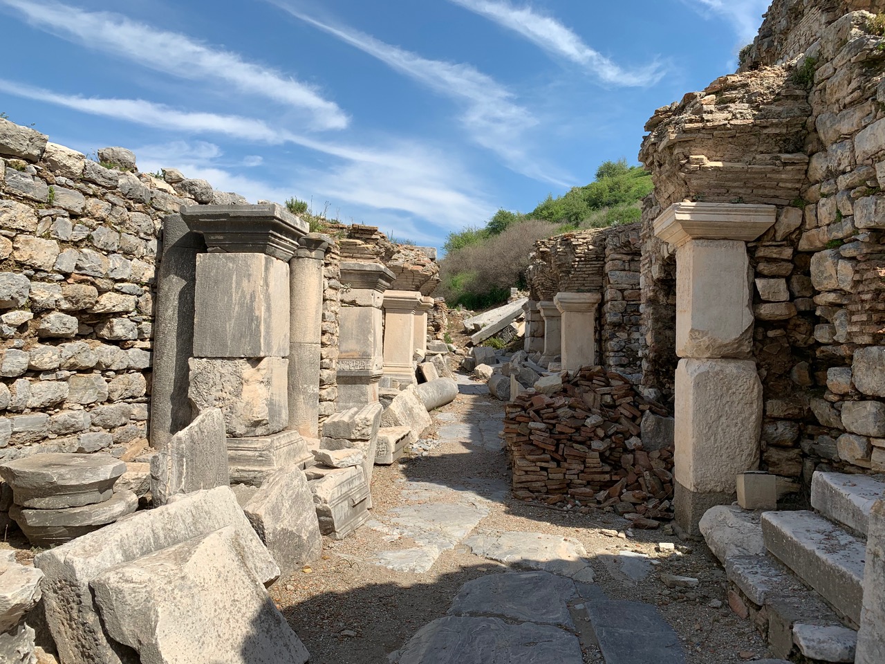 Rows of stone shops in a narrow alley