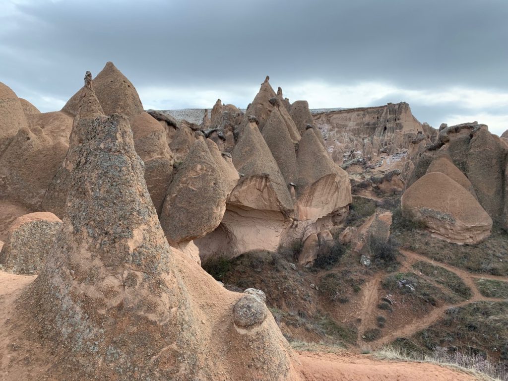 conical fairy chimneys in Cappadocia shaped by the wind