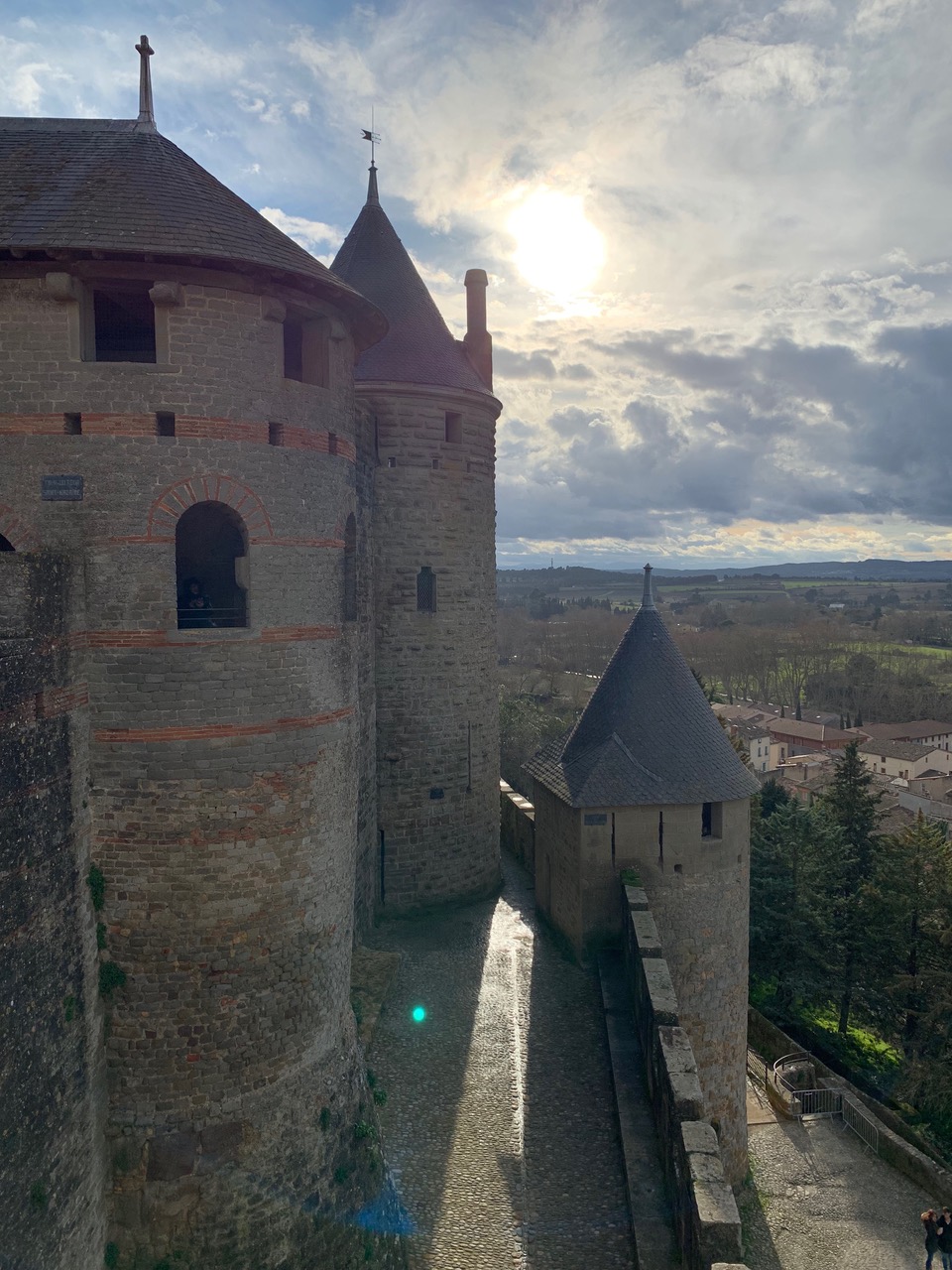 ramparts of Carcassonne with the sun shining