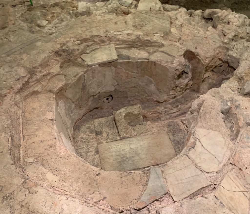 circular hole formed of white squarestones