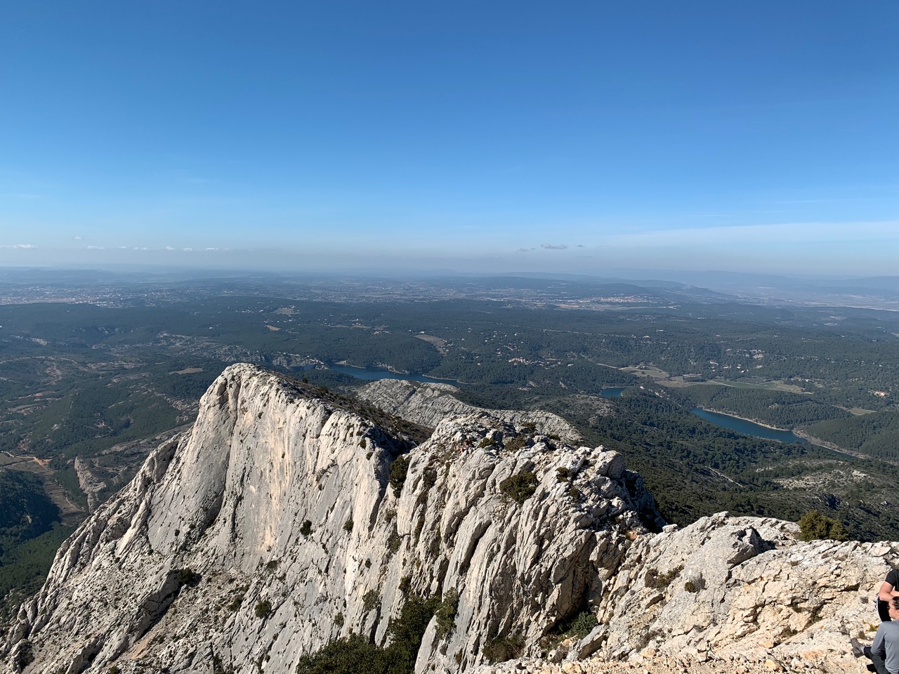 The rocky top of Montagne Sainte-Victoire and the view beyond