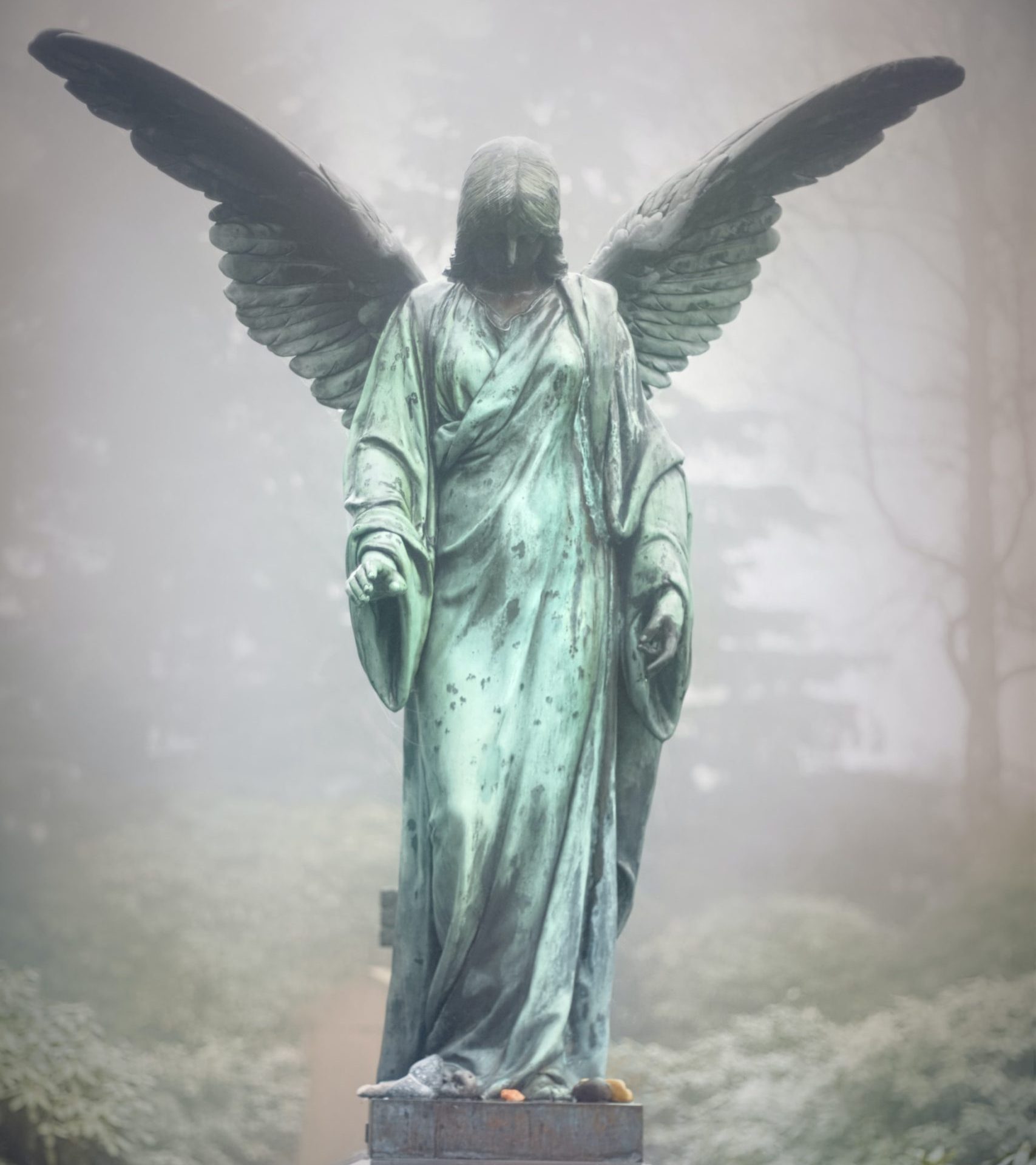 Angel statue in the mist