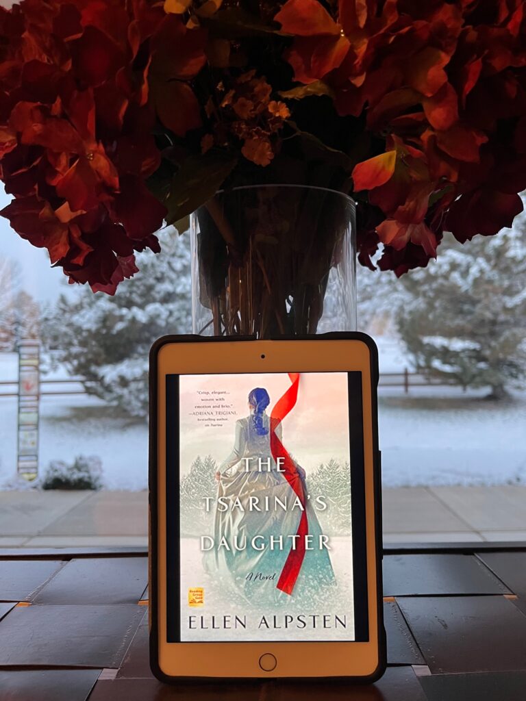 The Tsarina's Daughter novel with red flowers against a snowy backdrop